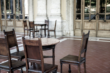 European restaurant exterior, empty chairs, lonely place, saddness, autumn