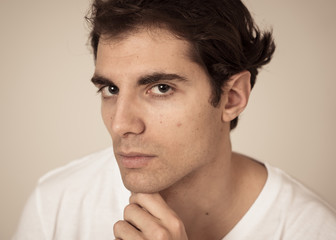 Naklejka premium Portrait of young handsome man posing happy for the camera. Beauty concept and lifestyle