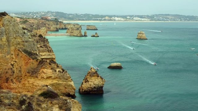 Limestone rocky sea coast near   Lagos, Algarve region, Portugal