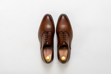 Classic male leather shoes. Isolated on white background. Top view