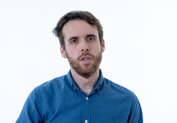 Fototapeta premium Portrait of sad and depressed man. Isolated in white background. Human expressions and emotions