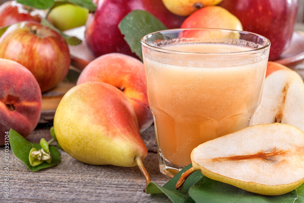 Wall mural freshly squeezed juice made from organic and healthy pears