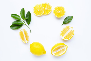 lemon and slices with leaves isolated on white.