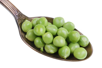 In the old golden spoon there is a small heap  of food - green pea fresh grains isolated