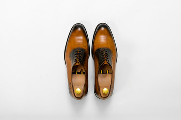 Classic male leather shoes. Isolated on white background. Top view
