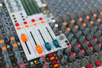 Analog sound mixer with selected focus. Professional audio mixing console radio and television...