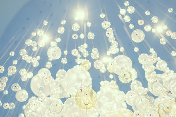 lantern hang on ceiling , Close up of several bulbs seeing their tungsten filaments , electricity...