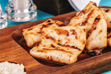 European cuisine, Mediterranean dish. grilled fish pieces with white and brown rice