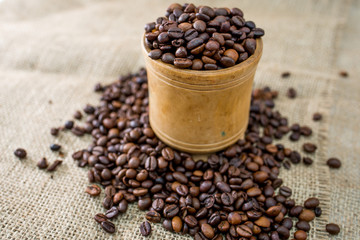 aroma coffee beans on wooden background