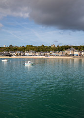 Obraz premium Cancale, fishing port and famous oysters production town located at the western end of the bay of Mont Saint-Michel on the Emerald Coast, Brittany, France