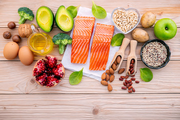 Ingredients for the healthy foods selection. The concept of healthy food set up on wooden background.