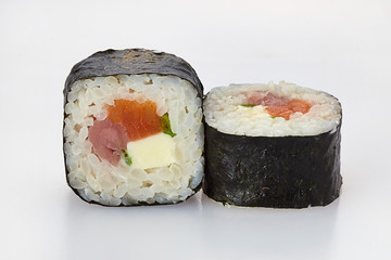 sushi in nori leaves with salmon cucumbers avocado cheese