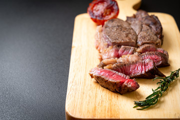 Grilled medium rare beef steak