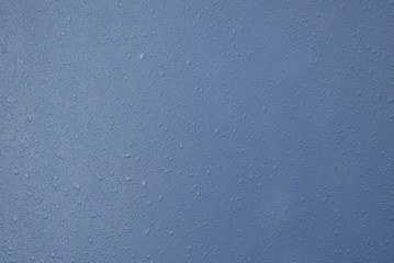 A blue metal style wall background and texture. 