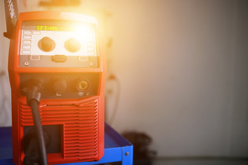 Red welding machines in the shop