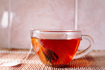 tea in a clear glass black
