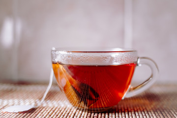 tea in a clear glass black