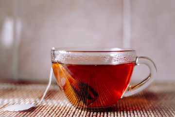 tea in a clear glass black