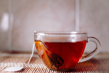 tea in a clear glass black