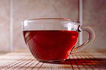 tea in a clear glass black