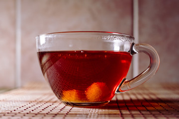 tea in a clear glass black