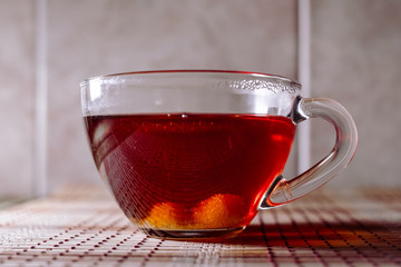tea in a clear glass black