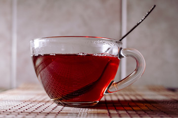 tea in a clear glass black