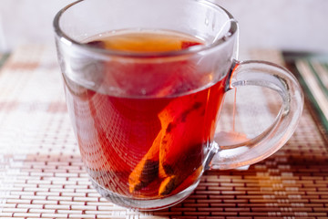 tea in a clear glass black