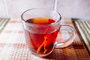 tea in a clear glass black