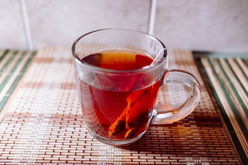 tea in a clear glass black