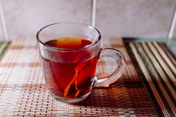 tea in a clear glass black