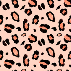 Leopard skin seamless pattern on peach pink background. Watercolor hand painted cheetah endless print with orange and black spots. Animalistic design print.
