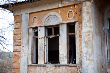 fragment old abandoned brick house.broken window. Destroyed manor Lyakhovo. Russia, Moscow region.