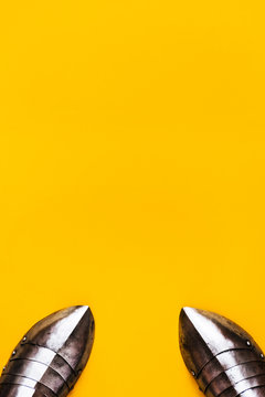 Historical medieval battle. Installation on a yellow background.