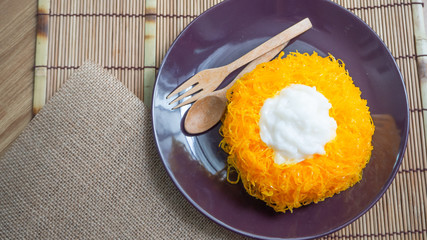 golden egg strips cake with black coffee for breakfast.	