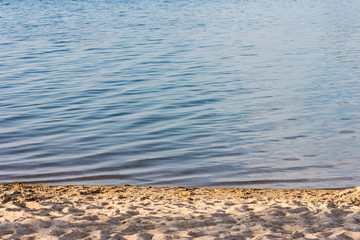 beach on the shore of a mountain lake
