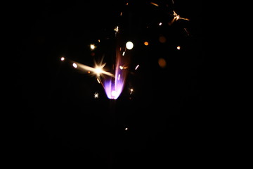 burning sparkler in the dark