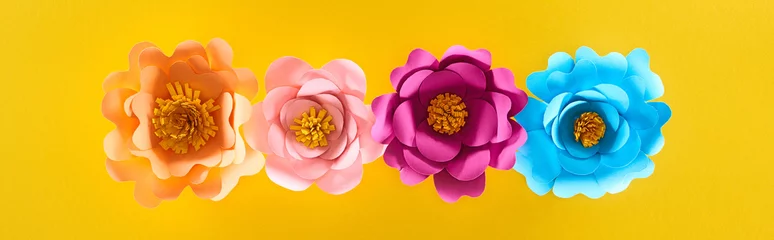 Fotobehang flat lay with paper cut multicolored bright flowers on yellow background, panoramic shot © LIGHTFIELD STUDIOS