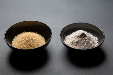 brown sugar and wheat in black asian bowls