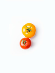 yellow and red tomatoes isolated on white