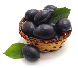Plums in basket.