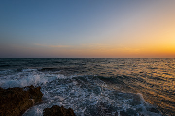 Adriatic sea. Ostuni, Puglia. Sunrise. Renowned seaside resort located in the heart of Salento. This stretch of coast is punctuated by a series of rocky beaches