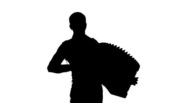 man musician plays the accordion masterly in the studio, black silhouette on a white background,isolated,close-up