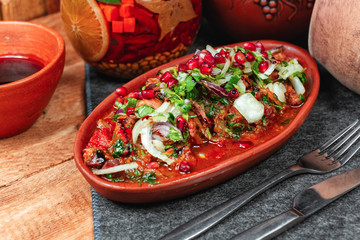 goulash from beef, veal and vegetables - tomato, cabbage, potatoes, served with greens and...
