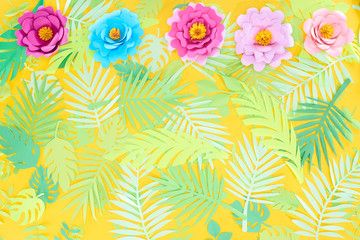 flat lay with paper cut multicolored flowers on tropical leaves on yellow bright background with copy space