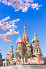 Fototapeta na wymiar St. Basil's Cathedral and Kremlin Walls in sunny sky. Red square is Attractions popular's touris in Moscow, Russia