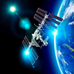 Fototapeta na wymiar The International Space Station (ISS) is a space station, or a habitable artificial satellite, in low Earth orbit. Satellite view of the earth and ISS. Element of this images are furnished by Nasa. 3d