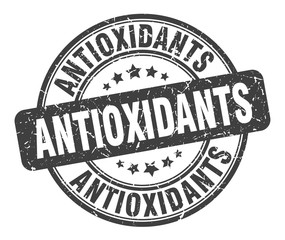 antioxidants stamp. antioxidants round grunge sign. antioxidants