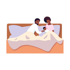 mom and dad taking care baby in bed