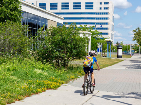 boy riding a bicycle in Gatineau Quebec